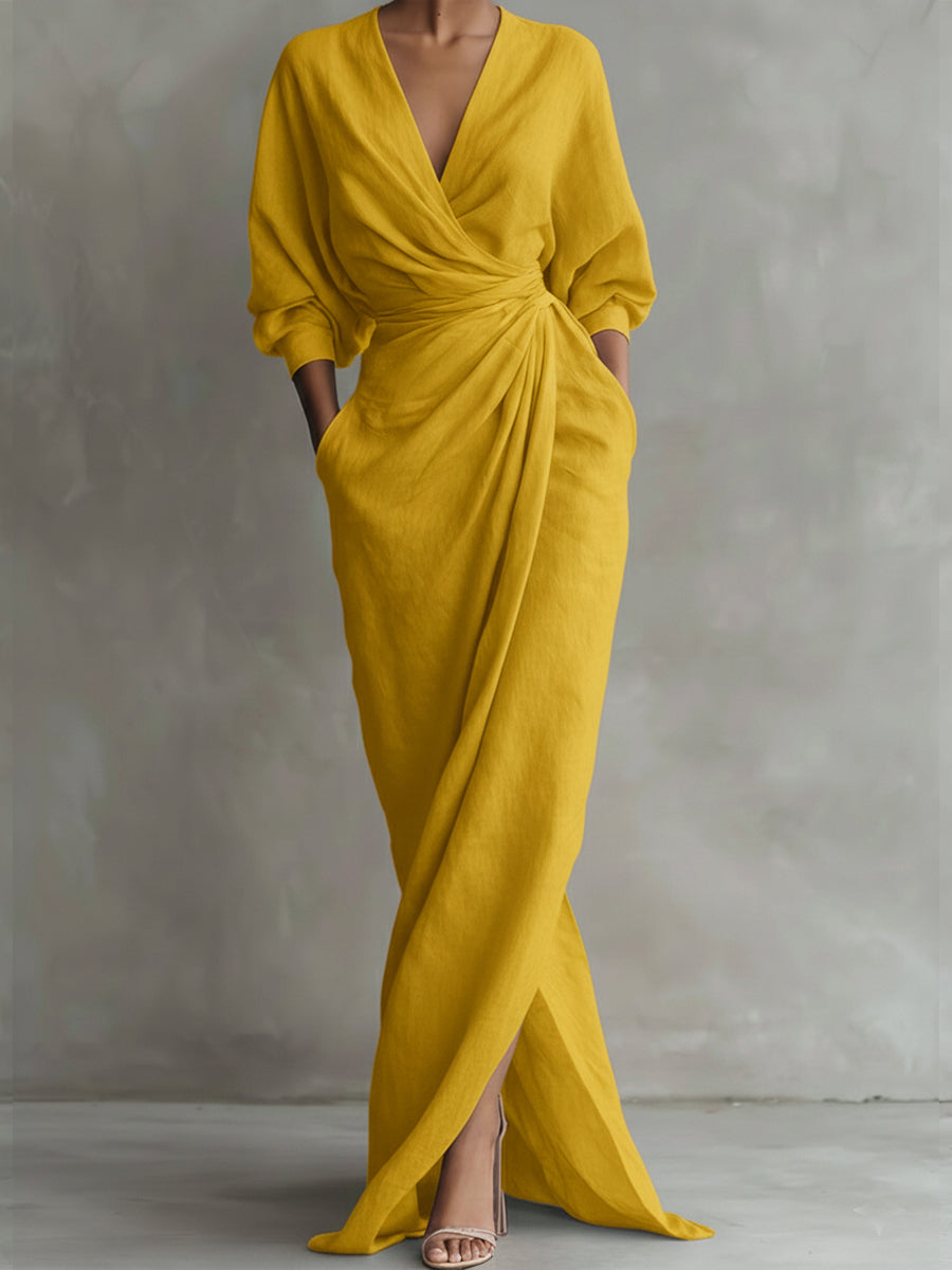 Yellow wrap maxi dress with V-neck, gathered waist and long puff sleeves