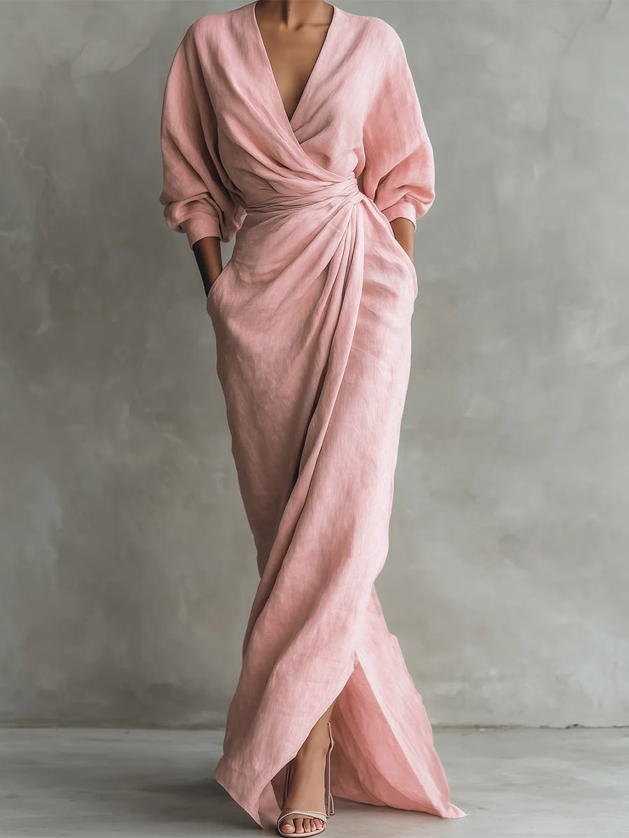 Pink wrap maxi dress with V-neck, gathered waist and long puff sleeves