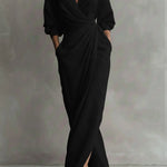 Black wrap maxi dress with V-neck, gathered waist and long puff sleeves