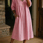 Antonia A-line maxi dress in blush pink, V-neck, 3/4 sleeves, gathered skirt.