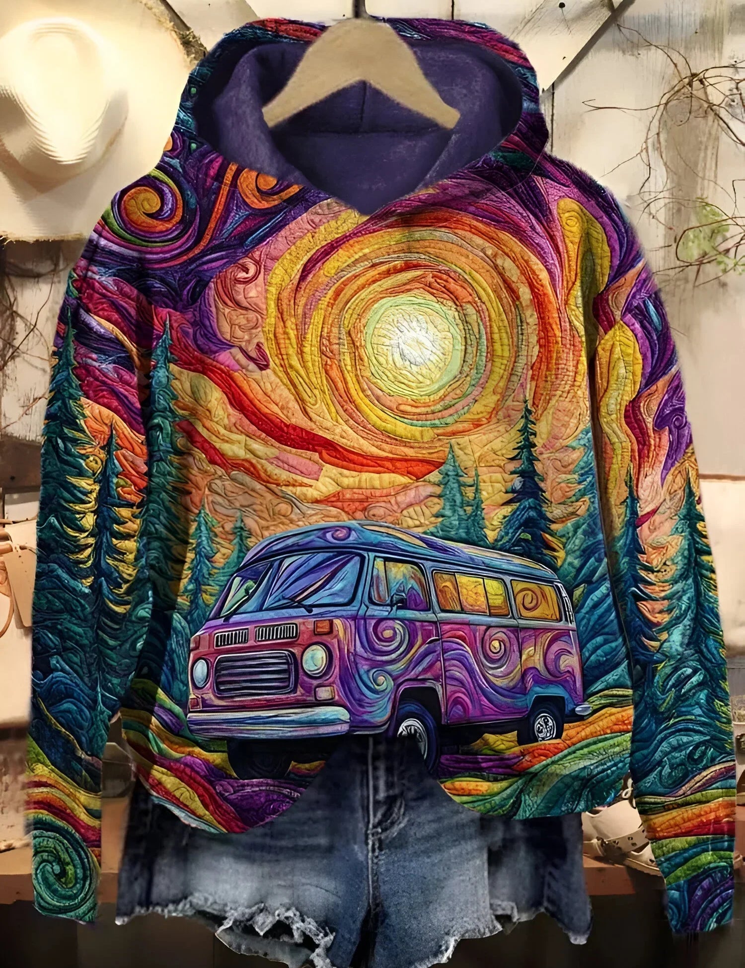 Retro roadtrip hoodie with multicolor psychedelic print, hood and front pouch, camper van and trees
