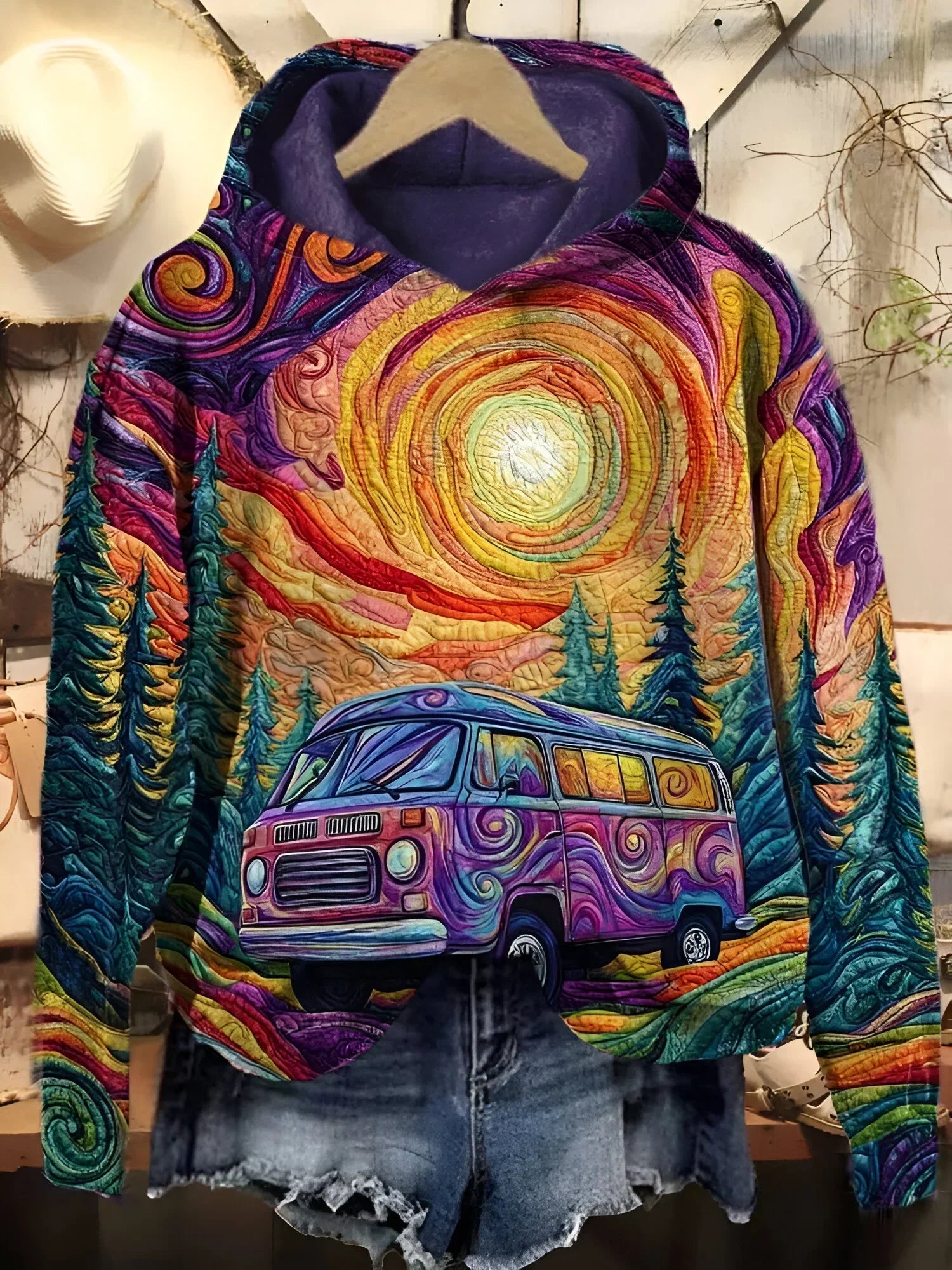 Retro roadtrip hoodie with multicolor psychedelic print, hood and front pouch, camper van and trees