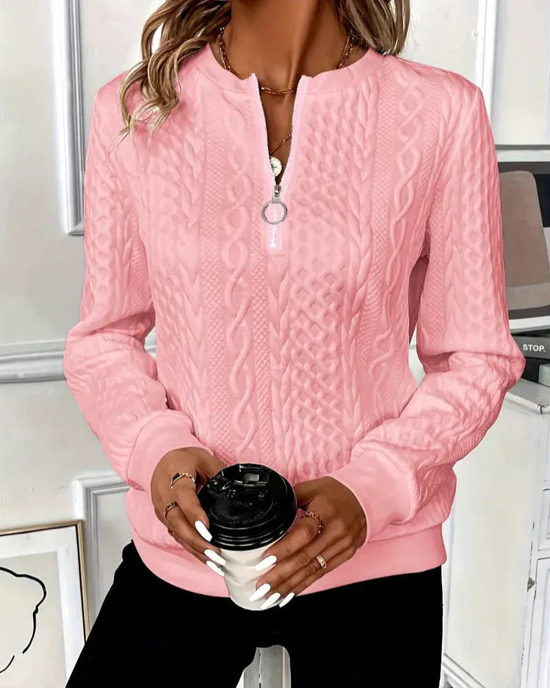 Women\u2019s half-zip cable-knit pullover sweater in pink with long sleeves