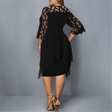 Plus-size midi dress, black with sheer lace sleeves and draped back panel