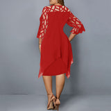 Plus-size midi dress, red with sheer lace sleeves and flowing back drape