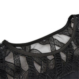 Black lace dress neckline with round cutout and sheer mesh trim