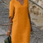 Josette V-neck midi dress in orange with three-quarter sleeves
