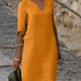 Josette V-neck midi dress in orange with three-quarter sleeves