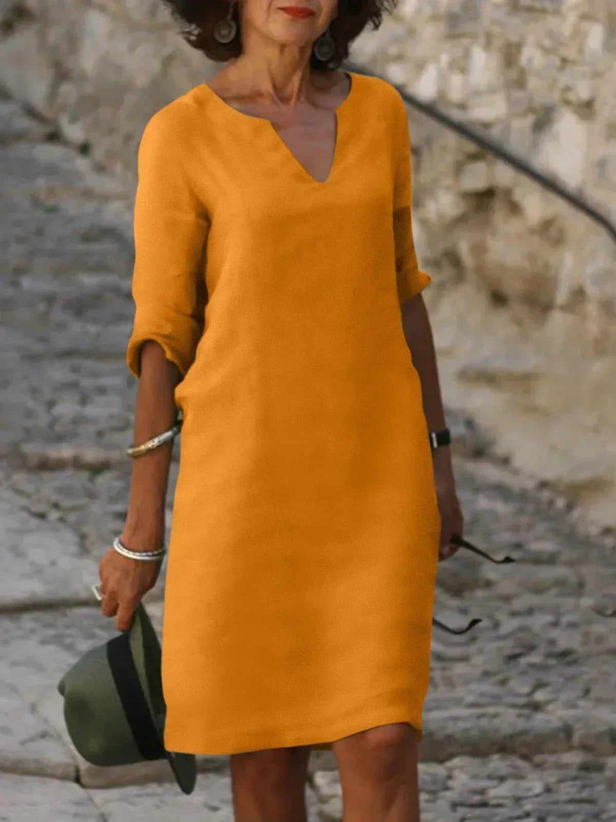Josette V-neck midi dress in orange with three-quarter sleeves