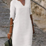 Josette V-neck midi dress in white with three-quarter sleeves