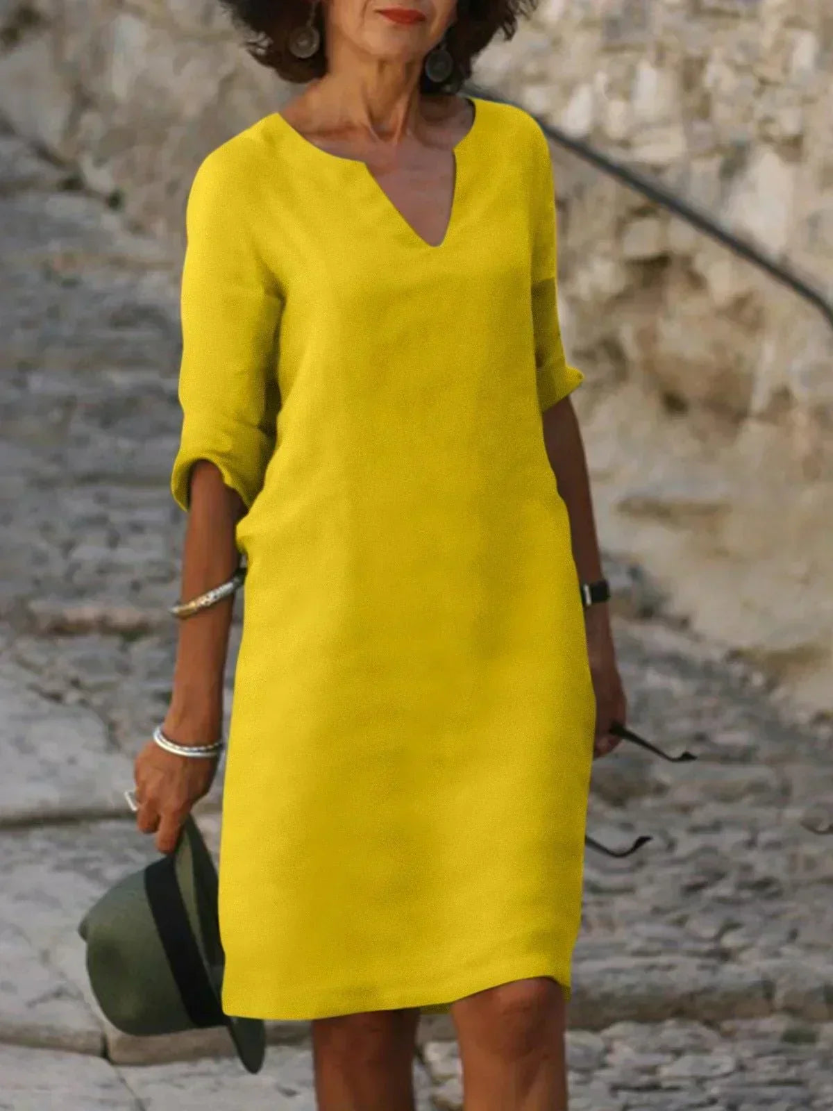Josette V-neck midi dress in yellow with three-quarter sleeves