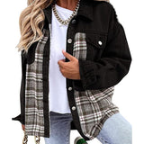 Black denim jacket with plaid lining, button front, and chest flap pockets