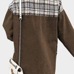 Brown denim jacket back with plaid yoke and front button placket