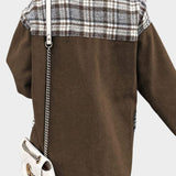 Brown denim jacket back with plaid yoke and front button placket