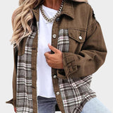 Brown denim jacket with plaid lining, button front, and chest flap pockets