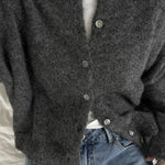Dark gray long-sleeve cardigan with round neck and button placket