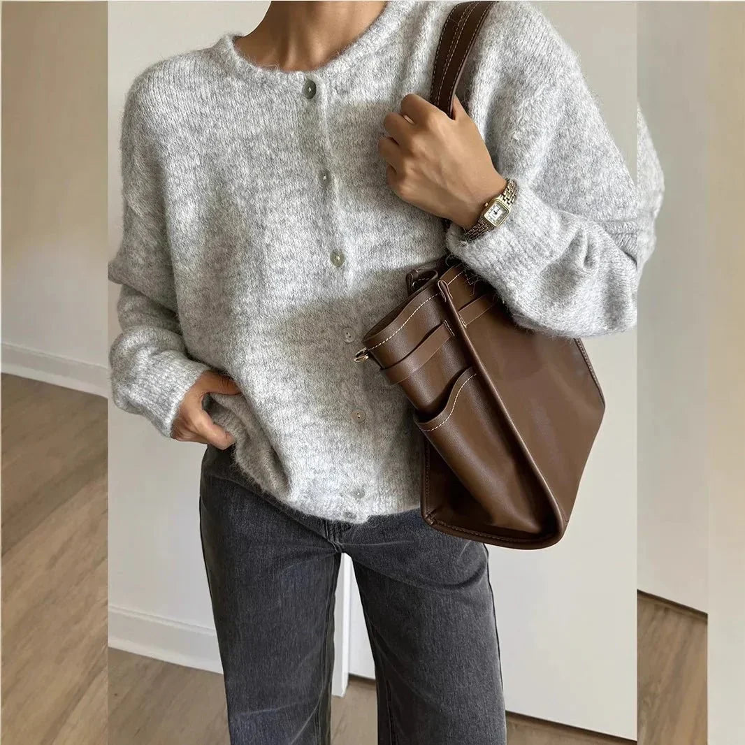 Light gray long-sleeve knit cardigan with round neck and button front