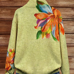 Women’s cardigan, light green knit with tropical lily artwork on shoulder and sleeves