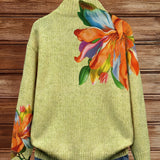 Women’s cardigan, light green knit with tropical lily artwork on shoulder and sleeves