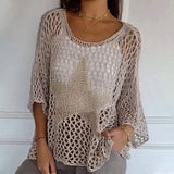 Khaki knit mesh top with gold-toned star applique, three-quarter sleeves, round crew neck