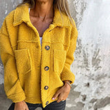 Yellow short wool jacket with lapels, button front, chest pockets, long sleeves
