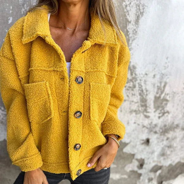 Yellow short wool jacket with lapels, button front, chest pockets, long sleeves