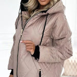 Light pink quilted hooded jacket with front zipper and drawstring hood, long sleeves