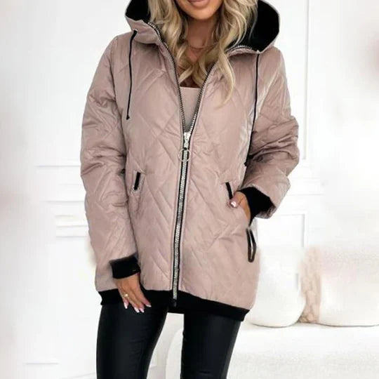 Light pink quilted hooded jacket with front zipper, drawstring hood and side pockets