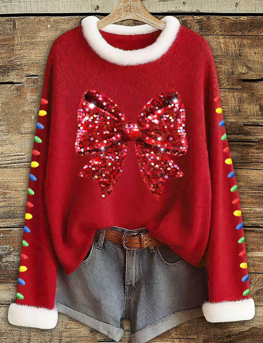 Women's red Christmas top with sequin bow and white faux-fur trim
