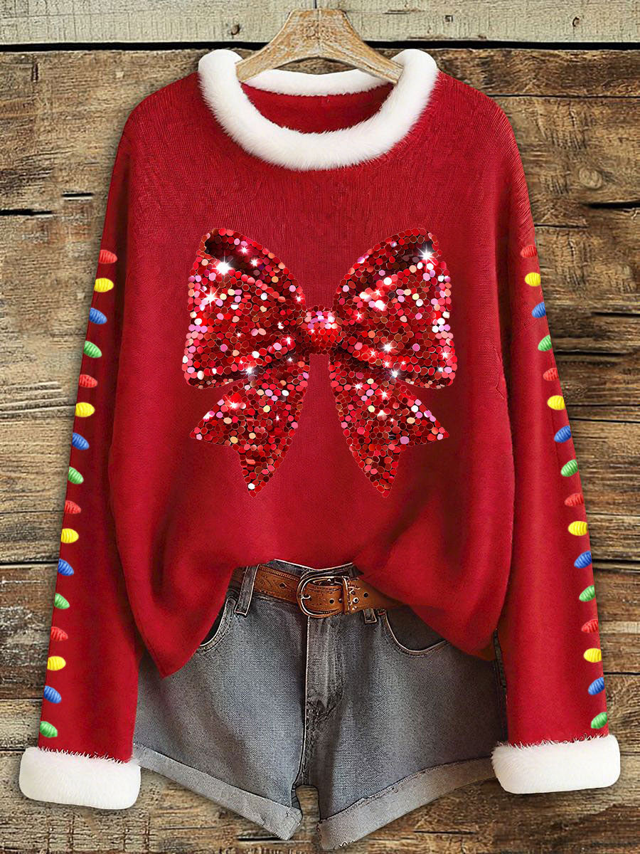 Women's red Christmas top with sequin bow and white faux-fur trim