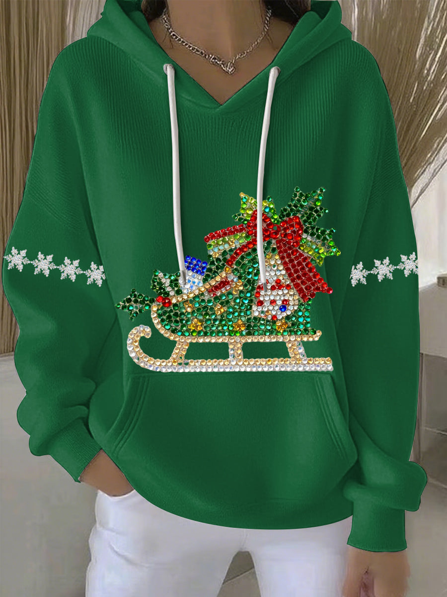 Green womens holiday print hoodie with rhinestone sleigh graphic, white drawstrings