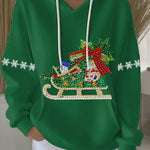 Green womens holiday print hoodie with rhinestone sleigh graphic, white drawstrings