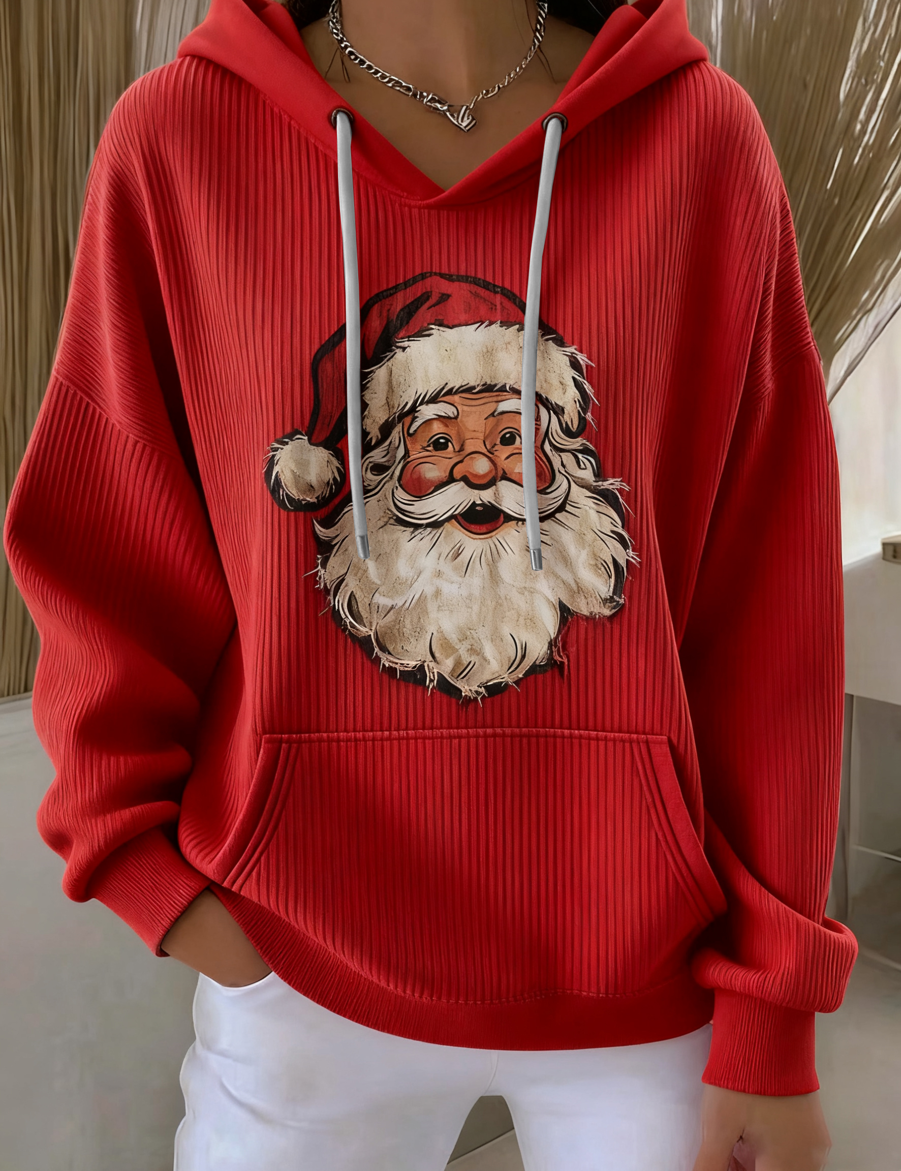 Red Santa Claus graphic pullover hoodie with hood, drawstrings, and front pouch pocket.