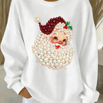White women’s crewneck sweatshirt with pearl Santa face print and long sleeves