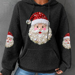 Black knit waffle hoodie with Santa Claus graphic and pearl-like bead accents
