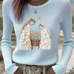 Light blue waffle-knit women's Christmas nativity long-sleeve top