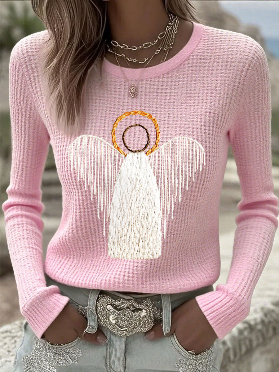 Pink knit sweater with angel nativity graphic, long sleeves