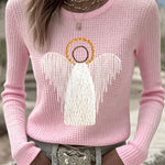 Pink knit sweater with angel nativity graphic, long sleeves
