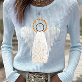 Light blue knit sweater with angel nativity graphic, long sleeves