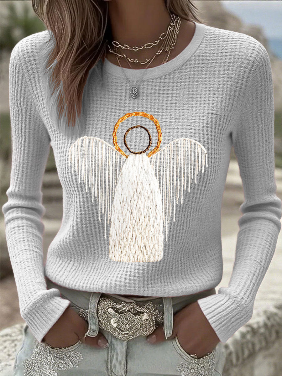 Light gray knit sweater with angel nativity graphic, long sleeves