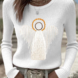White knit sweater with angel nativity graphic, long sleeves