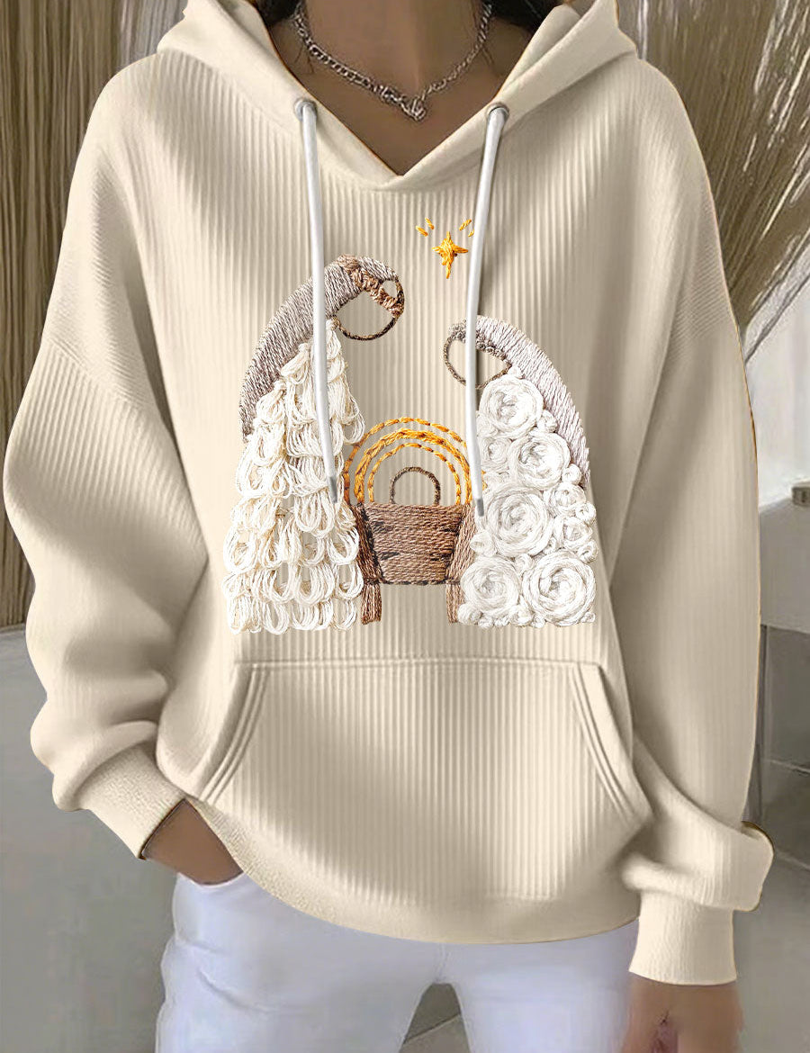 Cream ribbed women’s hoodie with embroidered nativity scene and drawstring hood
