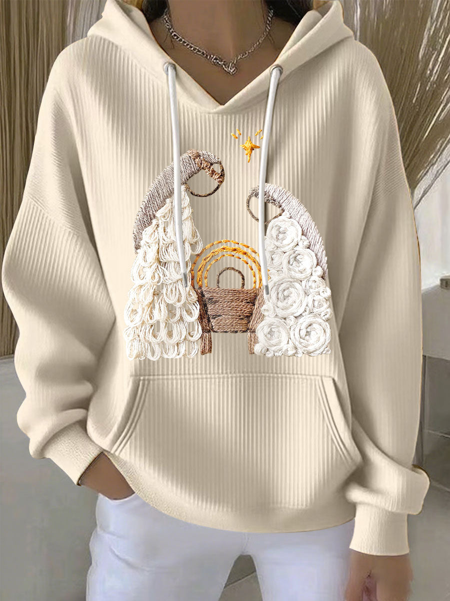 Cream ribbed women’s hoodie with embroidered nativity scene and drawstring hood