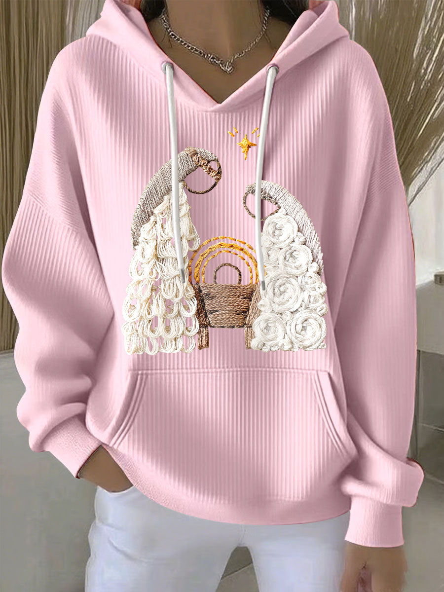 Pink ribbed women’s hoodie with embroidered nativity scene and drawstring hood