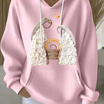 Pink ribbed women’s hoodie with embroidered nativity scene and drawstring hood