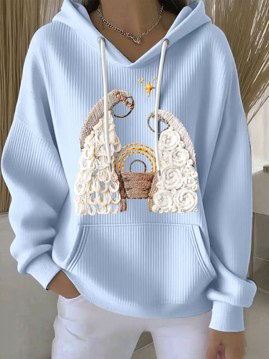 Light blue ribbed women’s hoodie with embroidered nativity scene, hood and drawstrings