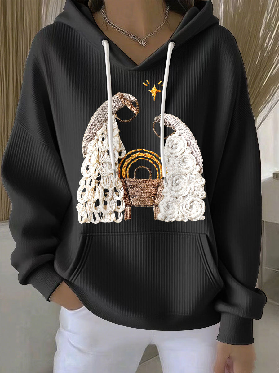 Black ribbed women’s hoodie with embroidered nativity scene and drawstring hood