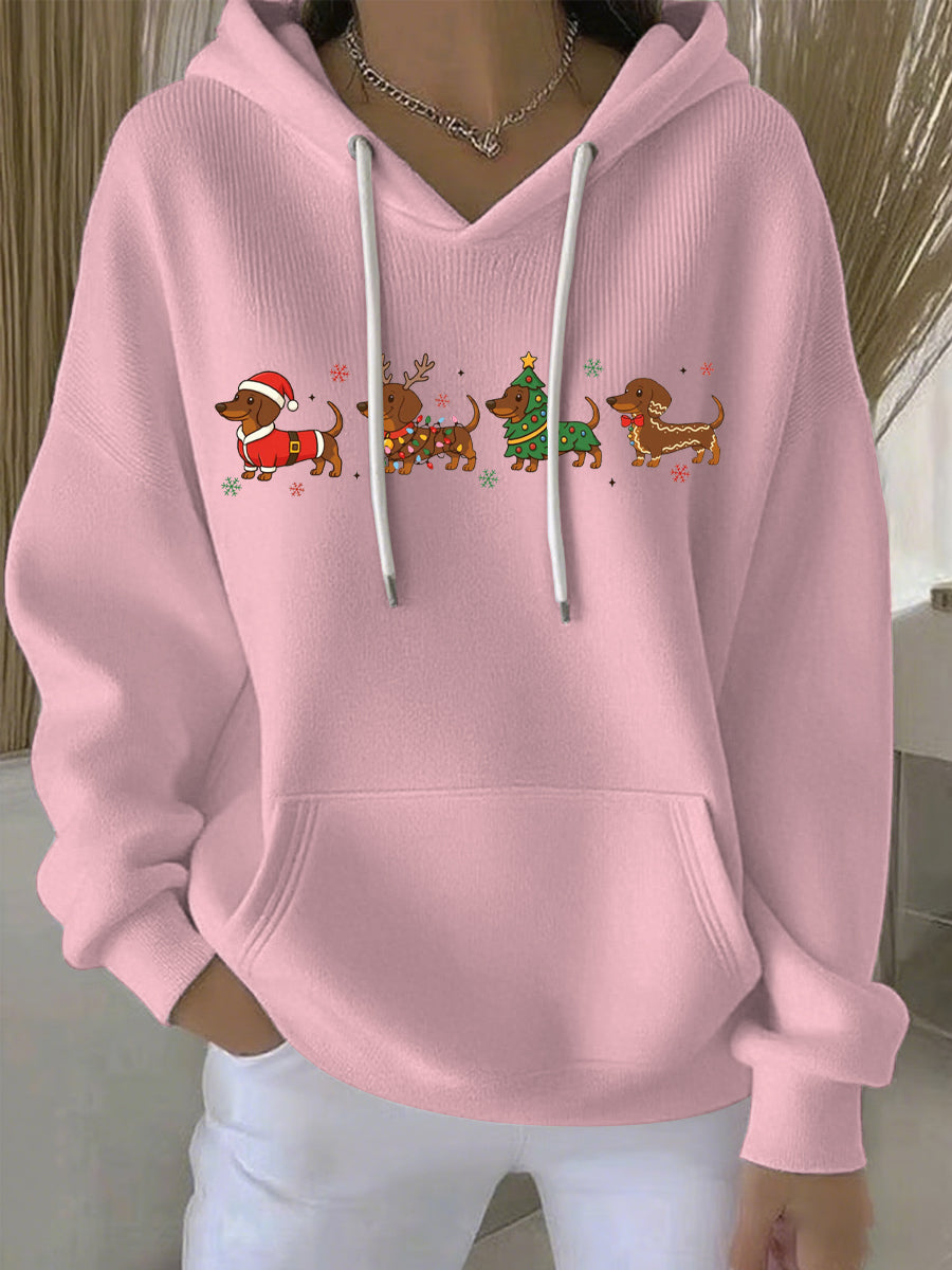 Pink women's Christmas graphic pullover hoodie with hood, white drawstrings, front print