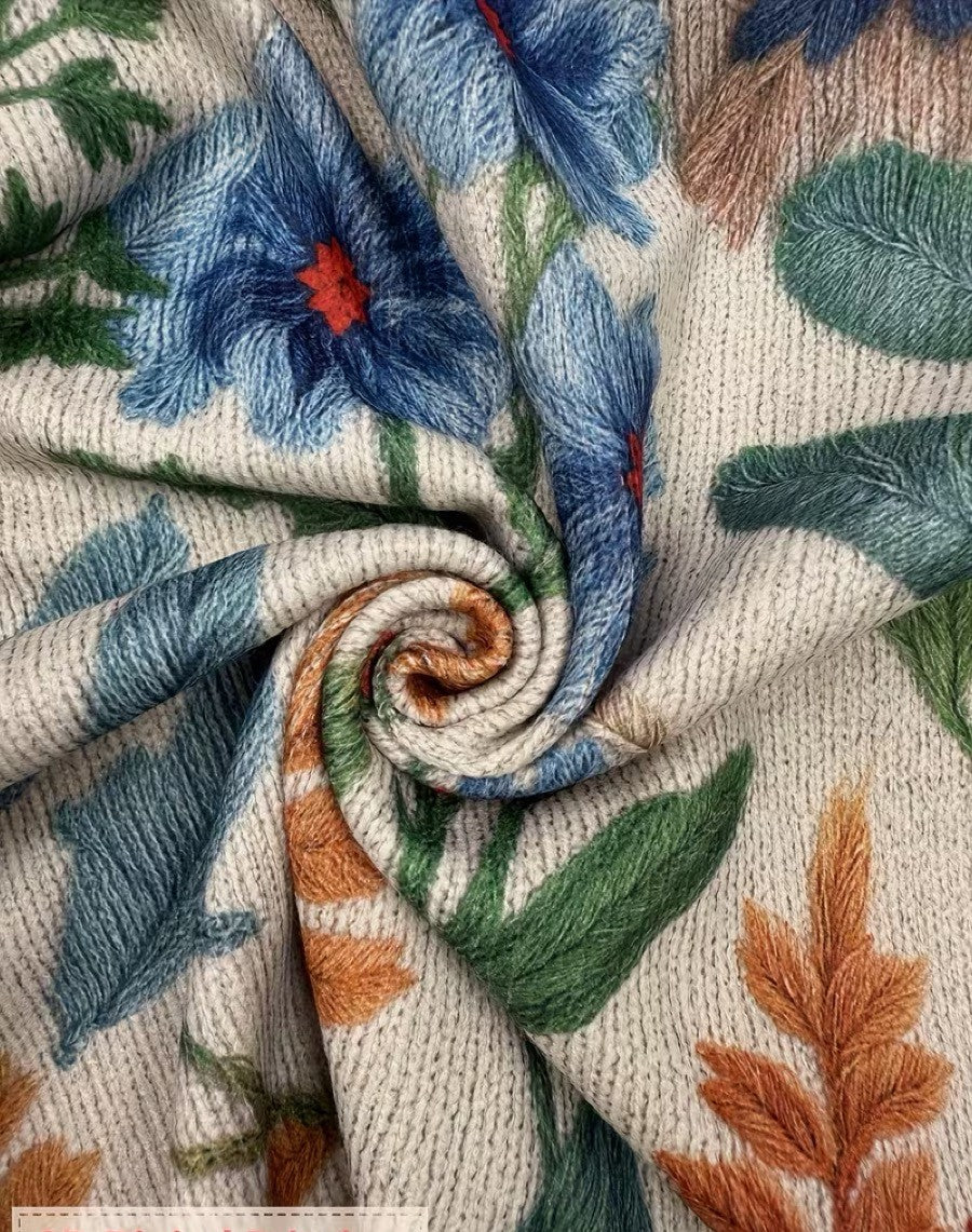 Floral knit cardigan fabric with embroidered leaf and flower motifs