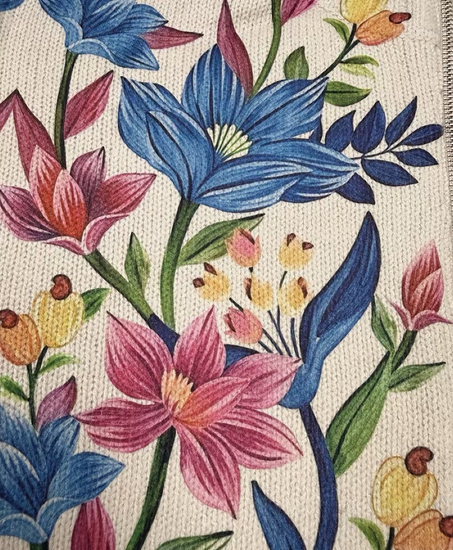 Floral knit cardigan with colorful blue and pink flower pattern